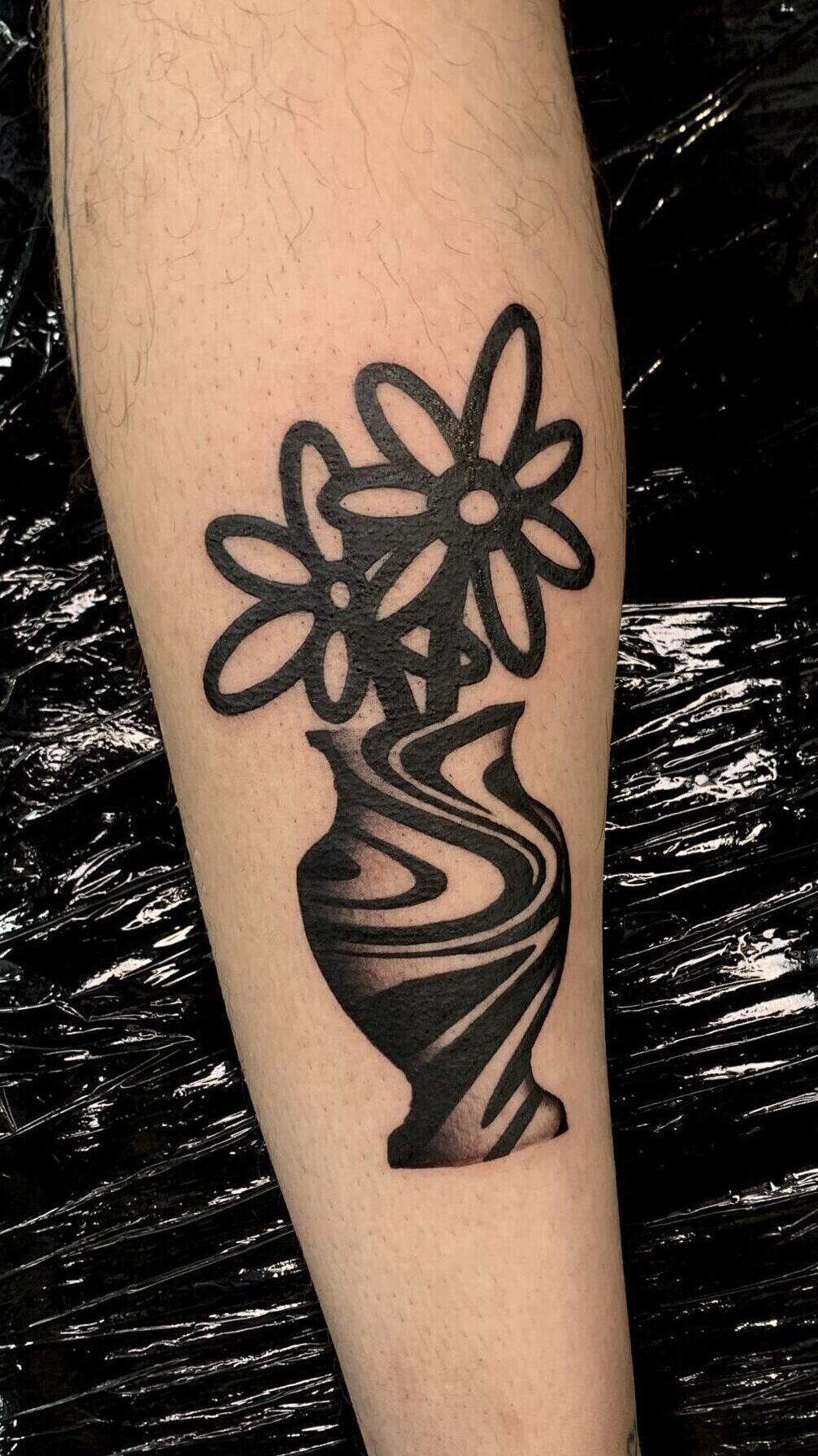 flower and vase tattoo